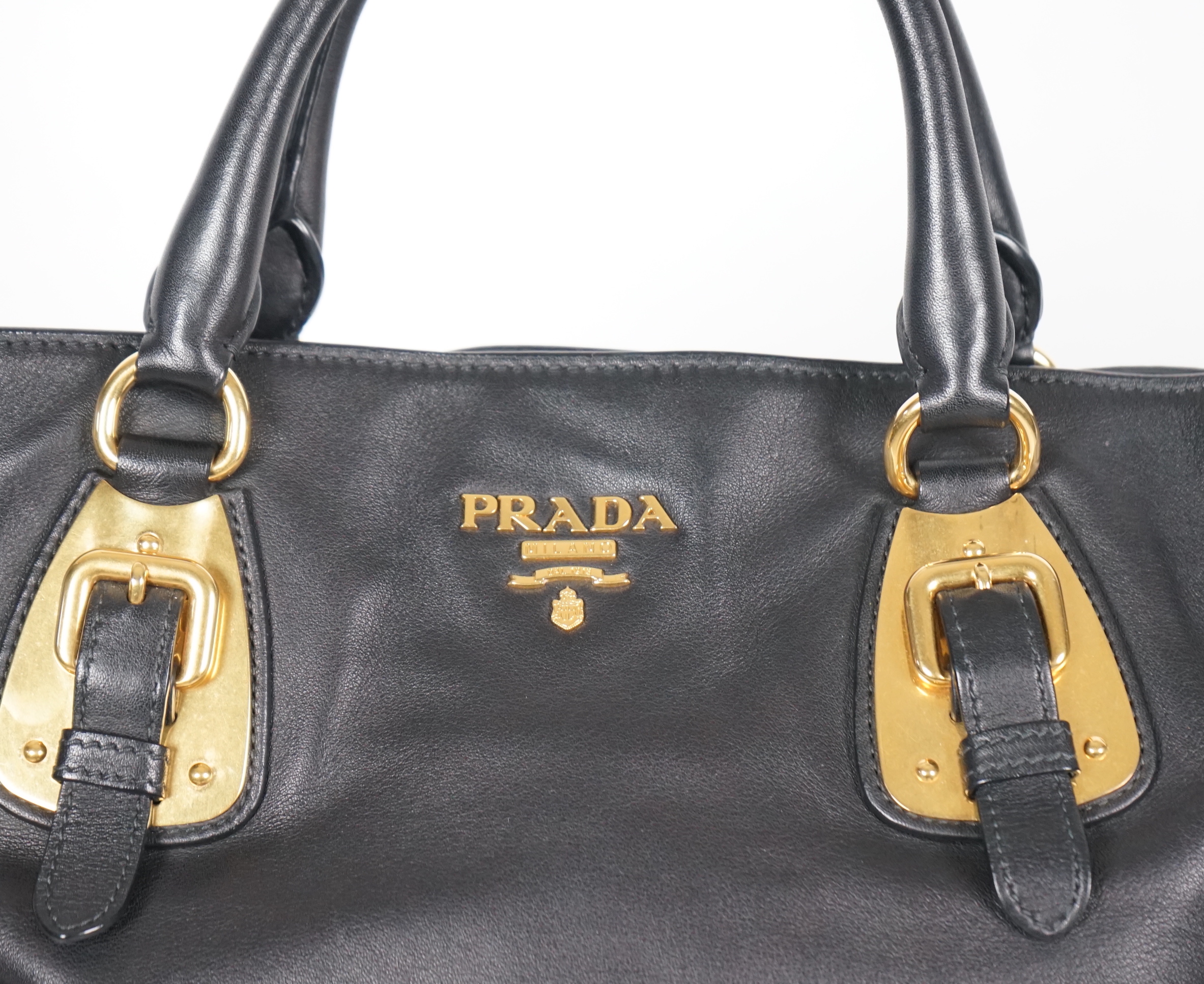 A Prada Vitello black leather bag with detachable strap, width 40cm, max heigh 27cm, depth 17cm